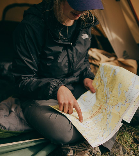 traveler holding a map